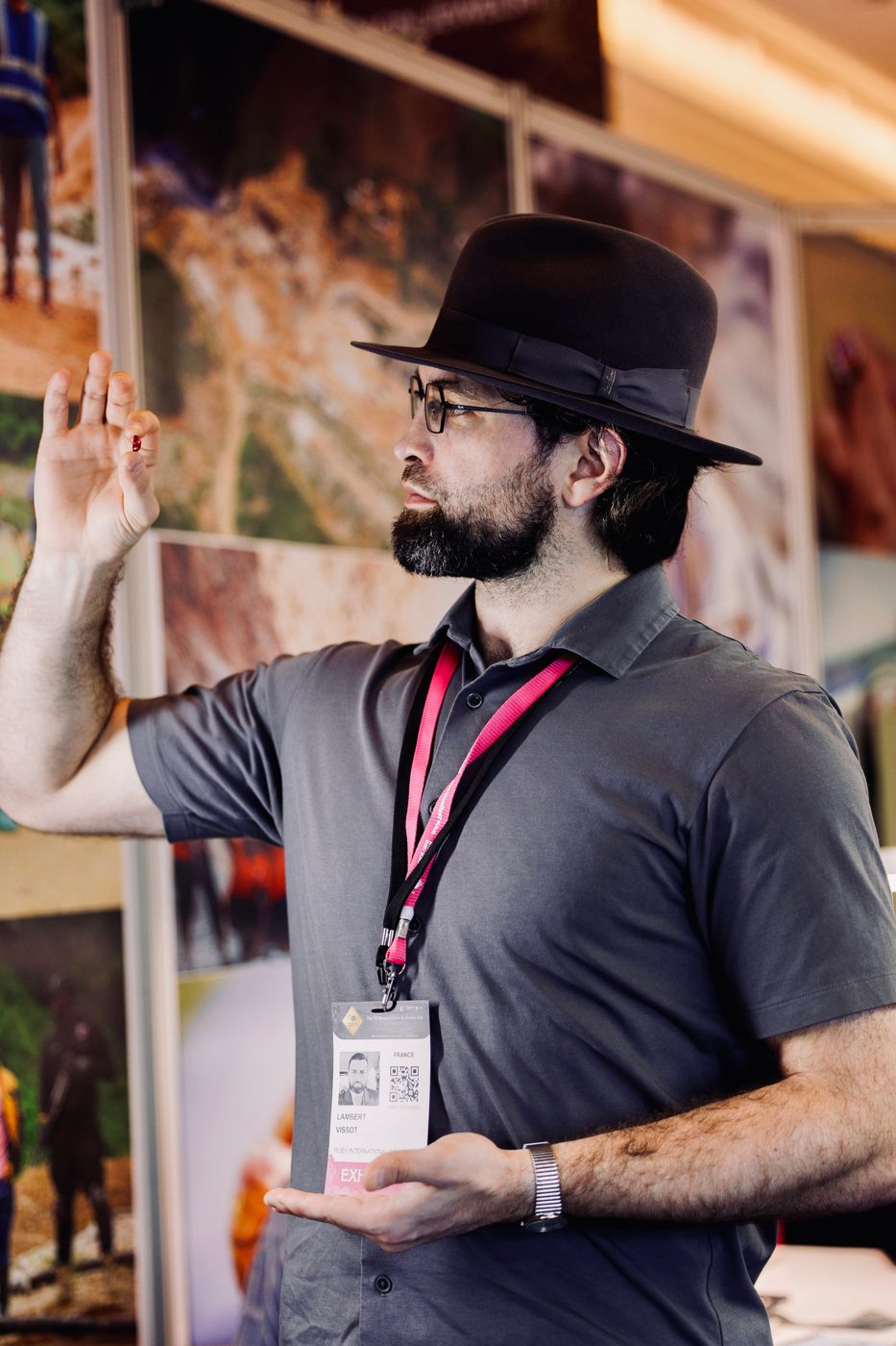 Lambert Vissot in conversation at a gem fair booth