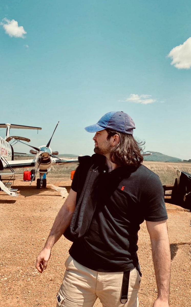 Lambert Vissot at a remote airstrip on the way to a gem field